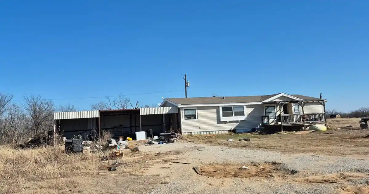 Areas We Serve 5 Manufactured home with open yard and covered carport in rural Petrolia Texas
